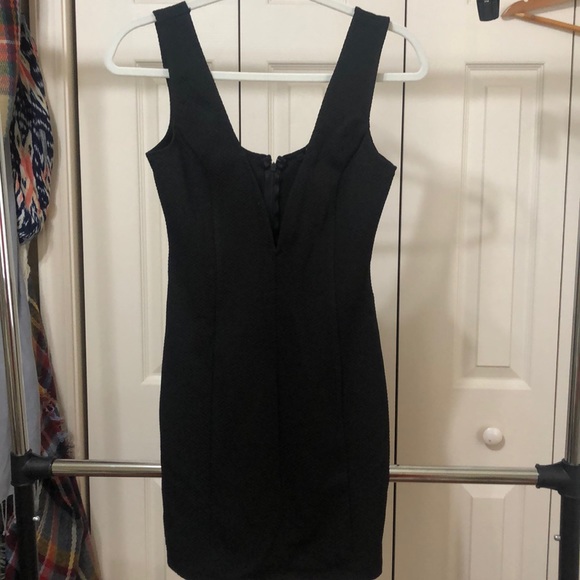 Forever 21 Dresses & Skirts - Low cut little black dress Forever 21 Dresses & Skirts - Low cut little black dress